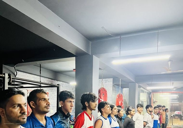 Officials and athletes at an academy event